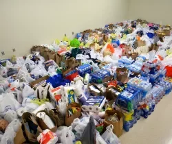 Helen Brett collects donations for Louisiana flood victims.
